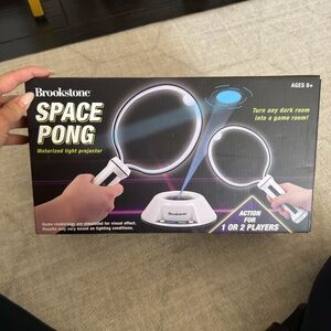 Brookstone Space Pong Motorized Light Projector - Black/White NIB